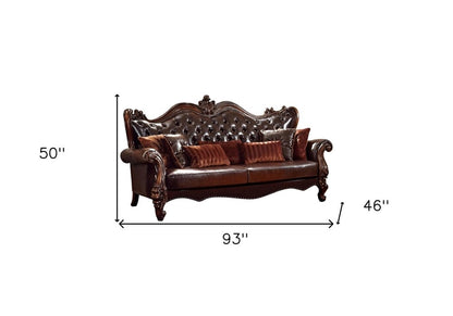 93" Brown Faux Leather Sofa And Toss Pillows With Burgundy Legs HomeRoots
