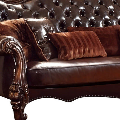 93" Brown Faux Leather Sofa And Toss Pillows With Burgundy Legs HomeRoots