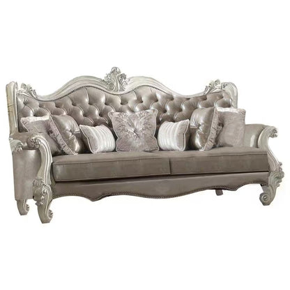 90" Gray Faux Leather Curved Sofa And Toss Pillows With Bone Legs HomeRoots