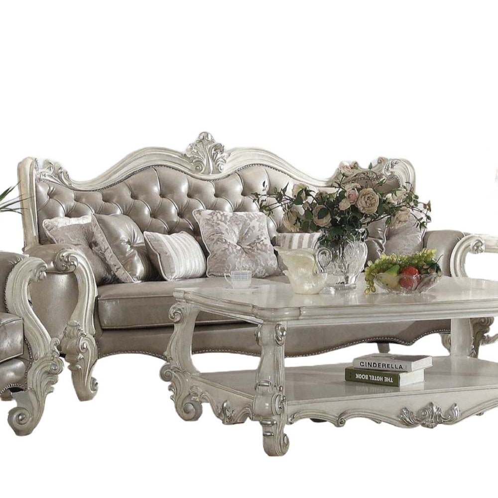 90" Gray Faux Leather Curved Sofa And Toss Pillows With Bone Legs HomeRoots