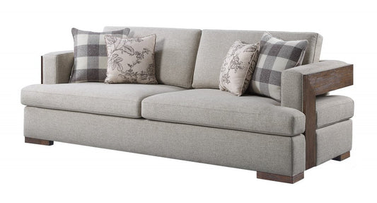 92" Beige Fabric Sofa And Toss Pillows With Brown Legs HomeRoots