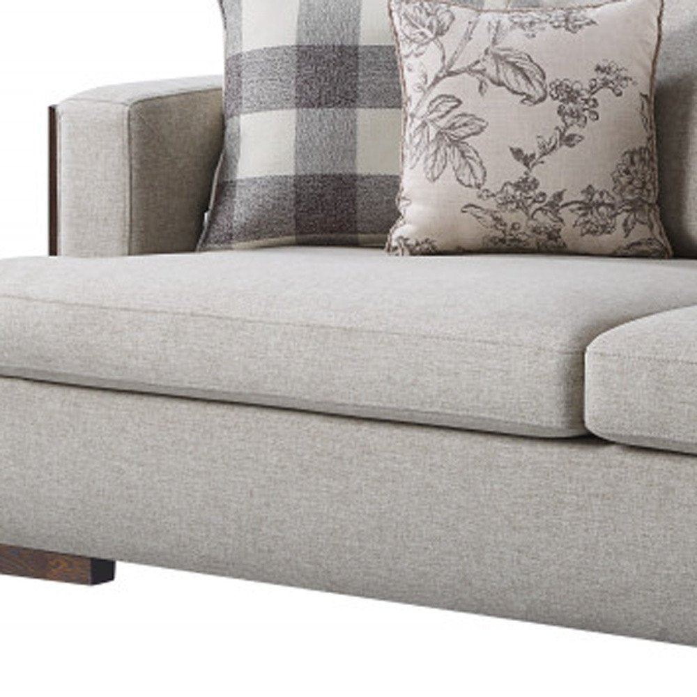 92" Beige Fabric Sofa And Toss Pillows With Brown Legs HomeRoots