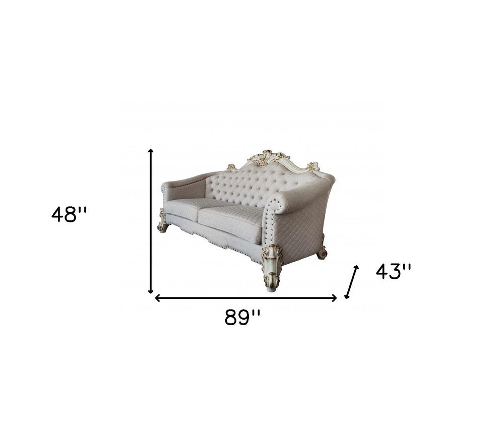 89" Ivory Velvet Sofa And Toss Pillows With Pearl Legs HomeRoots