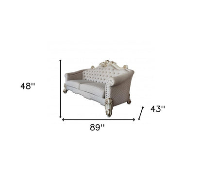 89" Ivory Velvet Sofa And Toss Pillows With Pearl Legs HomeRoots