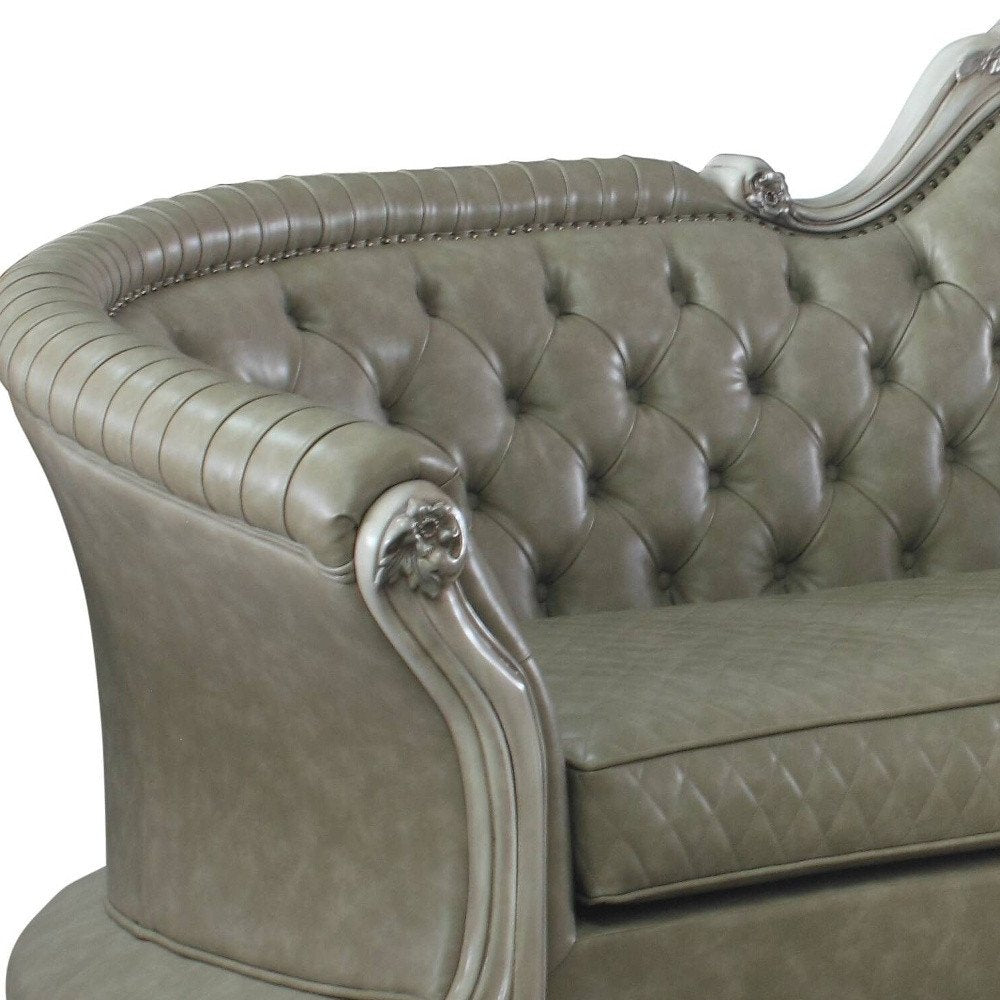 113" Bone Faux Leather Sofa And Toss Pillows With White Legs HomeRoots