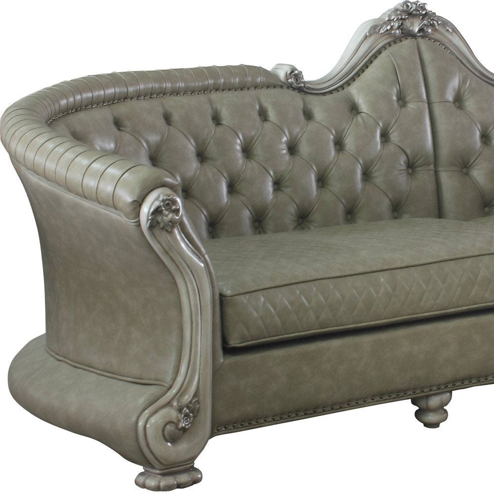 113" Bone Faux Leather Sofa And Toss Pillows With White Legs HomeRoots