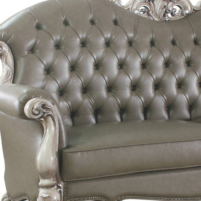 96" Bone Faux Leather Sofa And Toss Pillows With White Legs HomeRoots