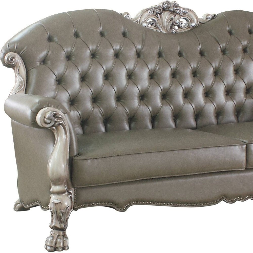 96" Bone Faux Leather Sofa And Toss Pillows With White Legs HomeRoots