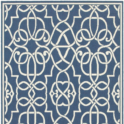 9' X 13' Blue and Ivory Geometric Stain Resistant Indoor Outdoor Area Rug