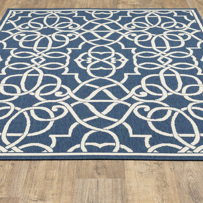 9' X 13' Blue and Ivory Geometric Stain Resistant Indoor Outdoor Area Rug