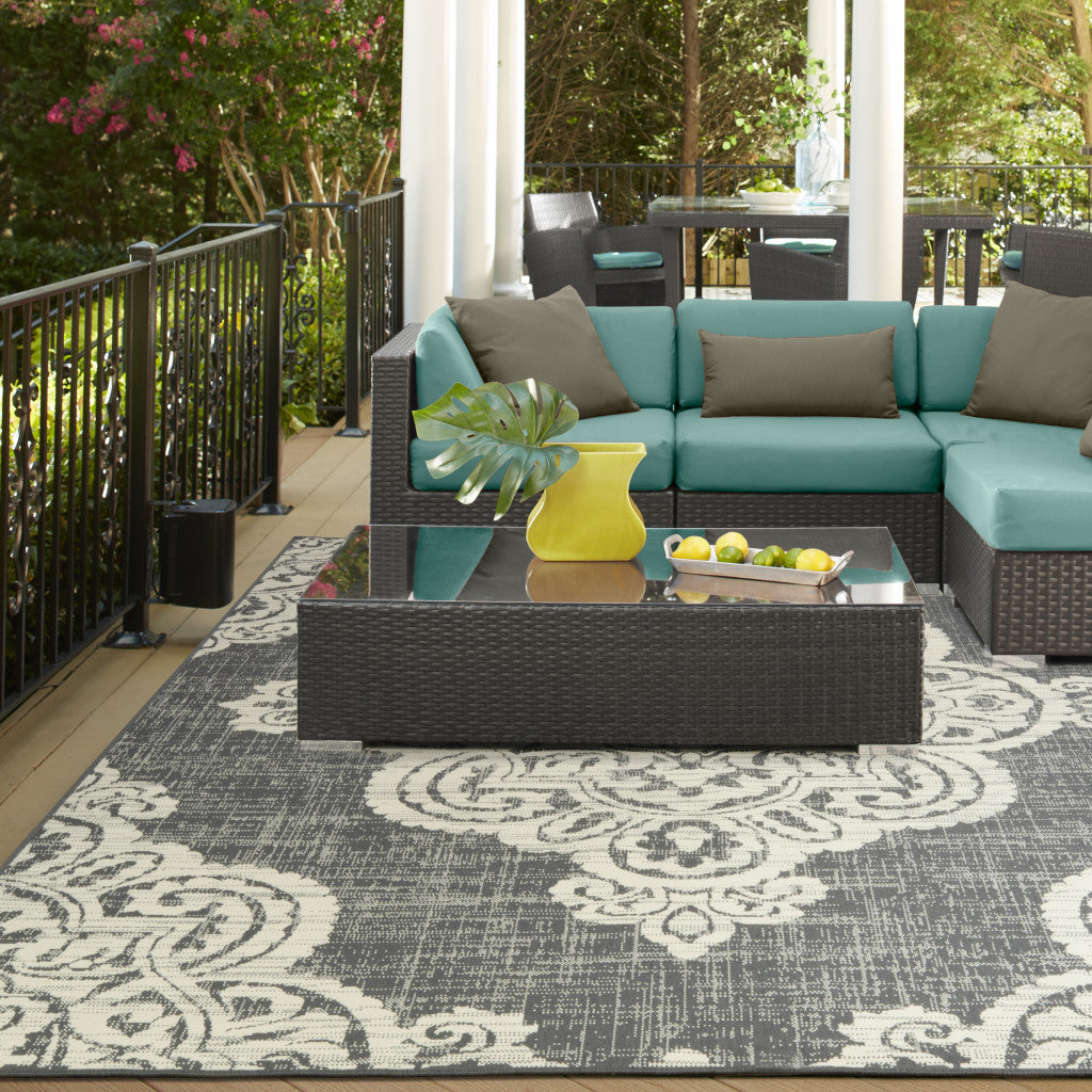 2' X 4' Gray and Ivory Oriental Stain Resistant Indoor Outdoor Area Rug