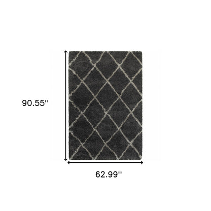 5' X 8' Charcoal And Grey Geometric Shag Power Loom Stain Resistant Area Rug