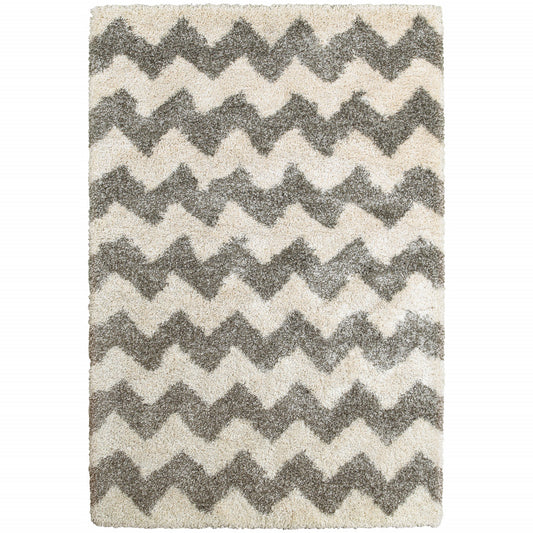 5' X 8' Grey And Ivory Geometric Shag Power Loom Stain Resistant Area Rug