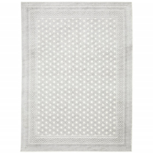 6' X 9' White And Grey Oriental Power Loom Stain Resistant Area Rug
