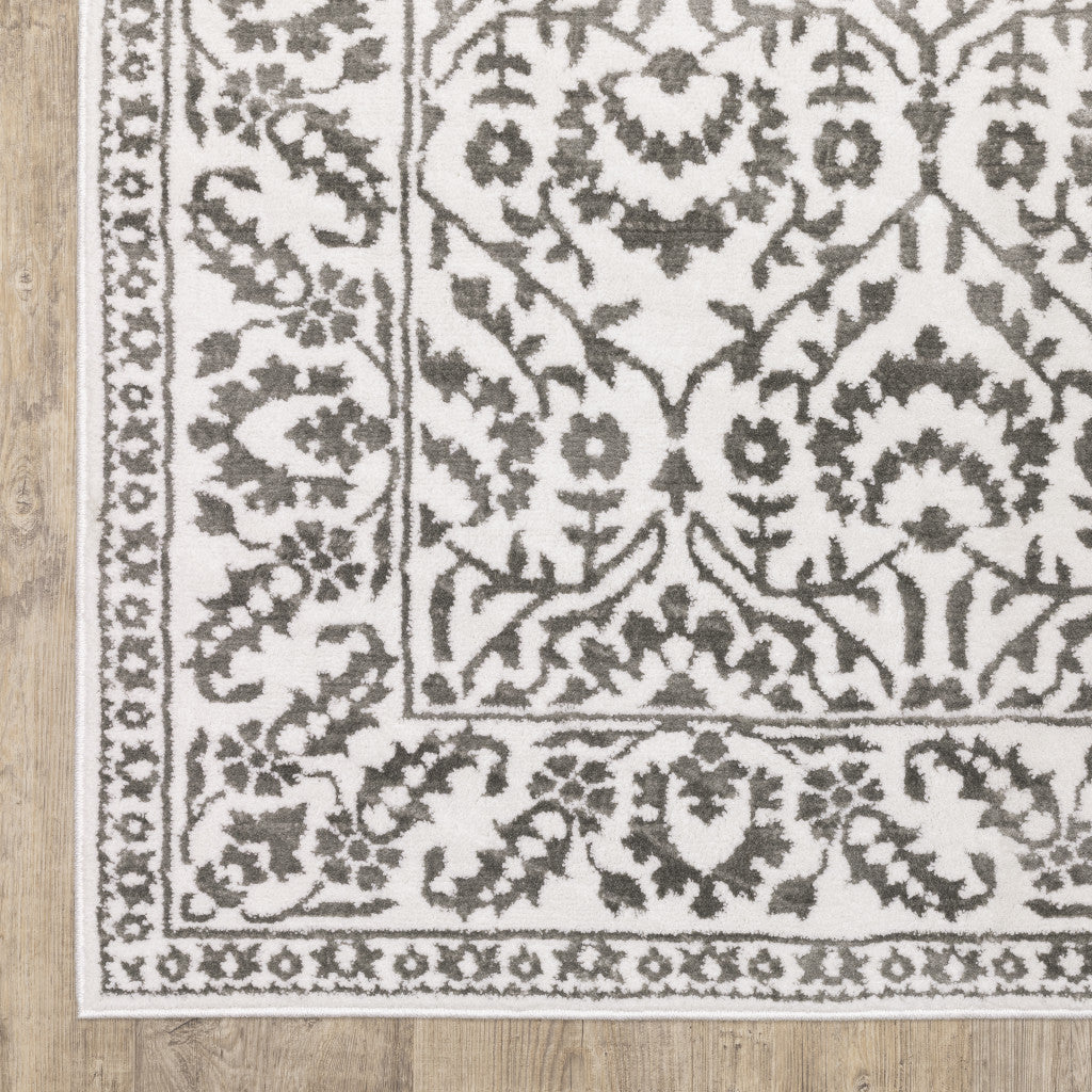 3' X 5' Grey And White Floral Power Loom Stain Resistant Area Rug