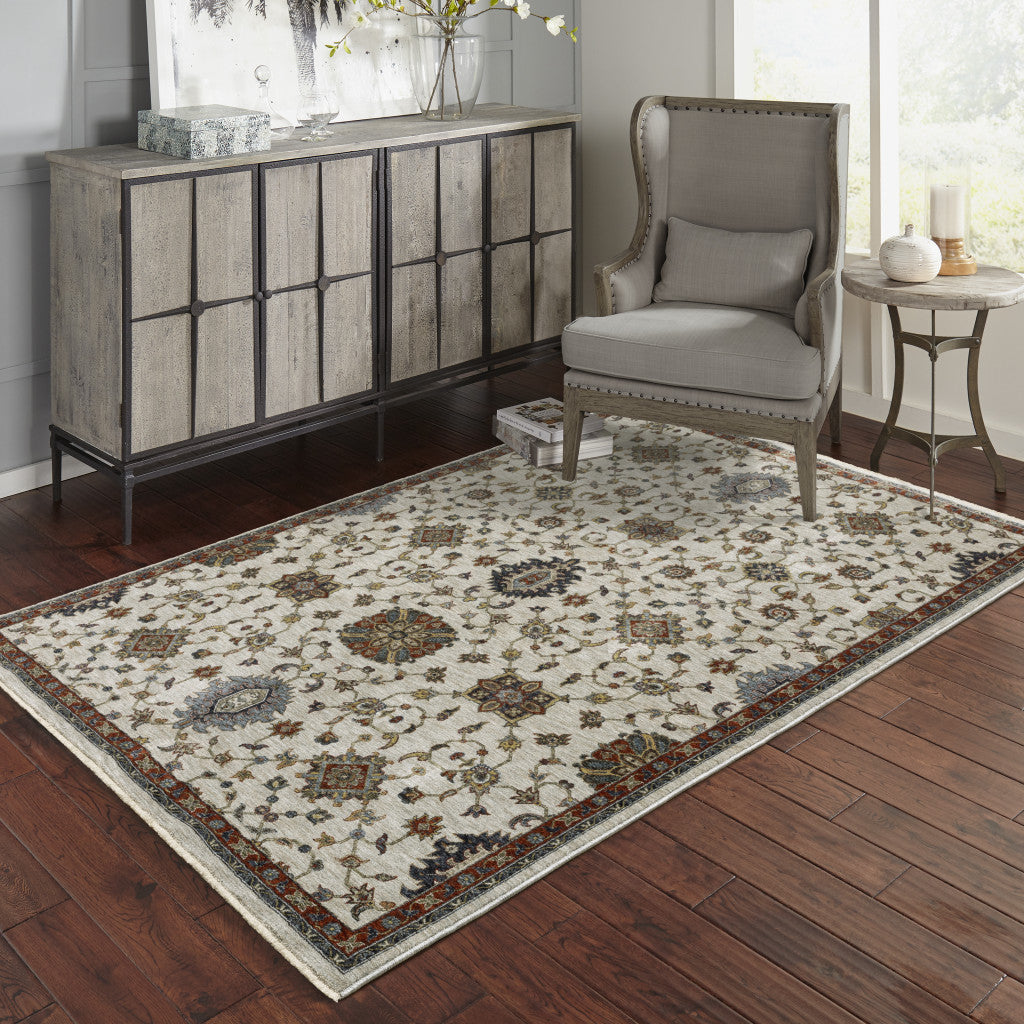 3' X 5' Beige Rust Red Blue Gold And Grey Oriental Power Loom Stain Resistant Area Rug With Fringe