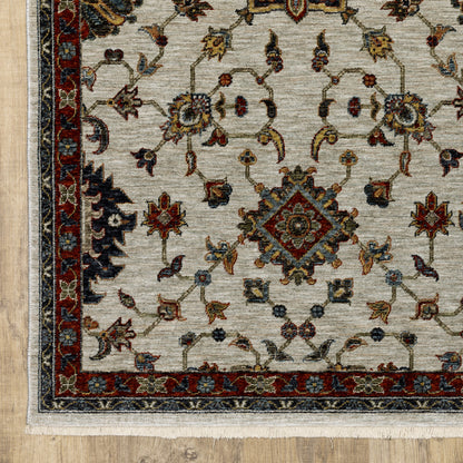 3' X 5' Beige Rust Red Blue Gold And Grey Oriental Power Loom Stain Resistant Area Rug With Fringe