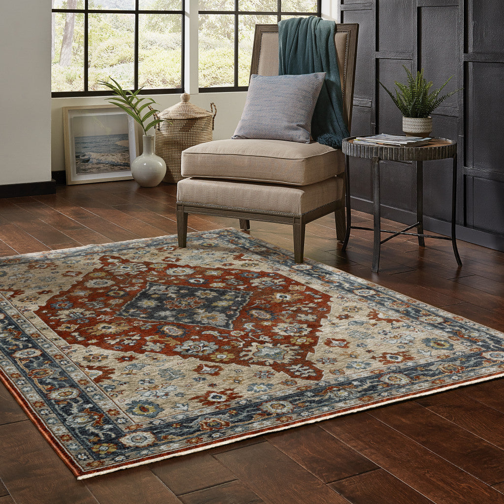 3' X 5' Blue Beige Tan Brown Gold And Rust Red Oriental Power Loom Stain Resistant Area Rug With Fringe