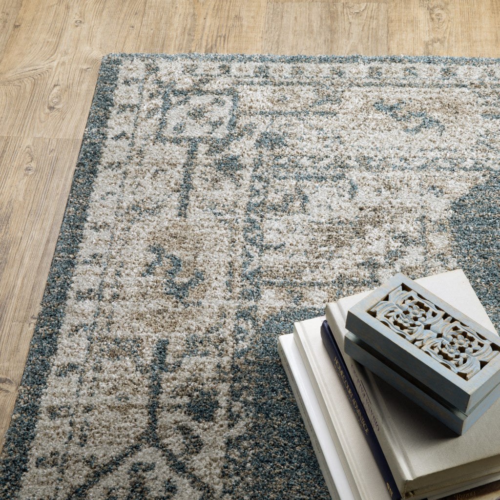 8' x 11' Blue and Beige Oriental Power Loom Area Rug