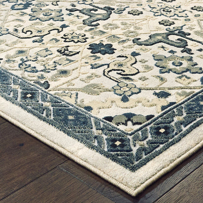 4' X 6' Ivory Navy And Gold Oriental Power Loom Stain Resistant Area Rug - 46.06" (H) x 64.96" (W) x 0.39" (D)