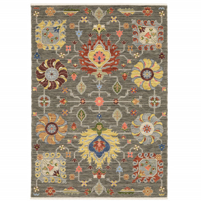 10' X 13' Grey Charcoal Yellow Blue Rust Red Pink Green And Ivory Oriental Power Loom Stain Resistant Area Rug With Fringe - 20.0" (L) x 34.0" (W) x 0.63" (H)