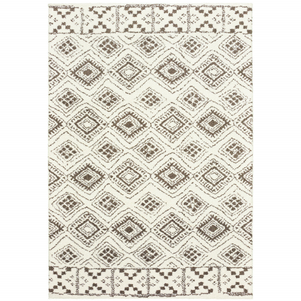 10' X 13' Ivory And Brown Geometric Shag Power Loom Stain Resistant Area Rug - 24.0" (L) x 36.0" (W) x 0.08" (H)