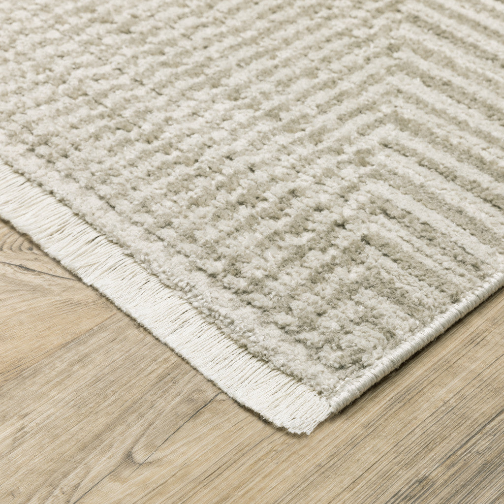 10' X 13' Ivory Beige Taupe And Tan Geometric Power Loom Stain Resistant Area Rug With Fringe - 24.0" (L) x 36.0" (W) x 0.4" (H)