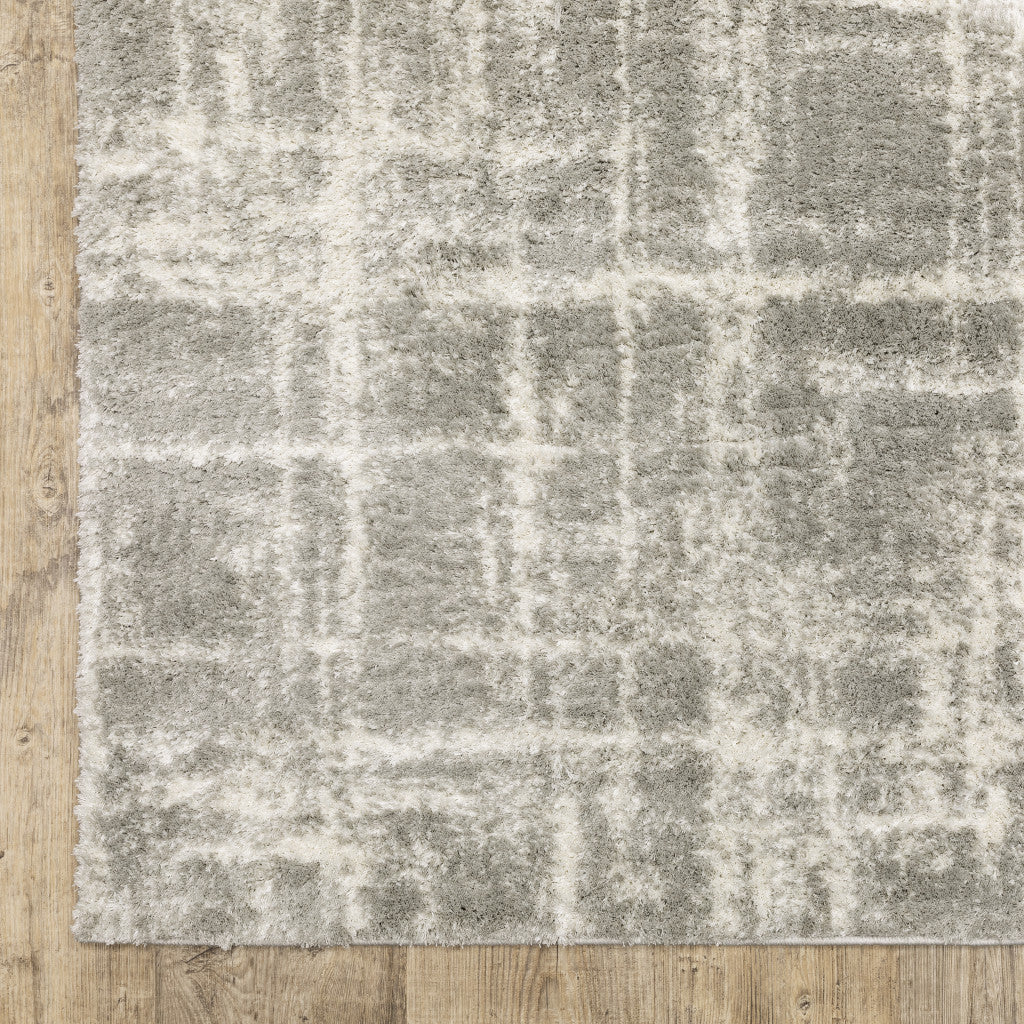 10' X 13' Grey And Ivory Abstract Shag Power Loom Stain Resistant Area Rug - 24.0" (L) x 36.0" (W) x 0.43" (H)