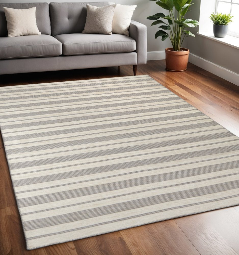 4' X 6' Gray and Ivory Striped Hand Woven Area Rug HomeRoots