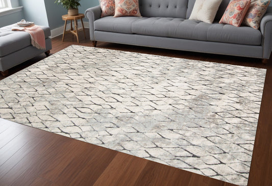 7' X 10' Ivory Gray And Taupe Abstract Stain Resistant Area Rug