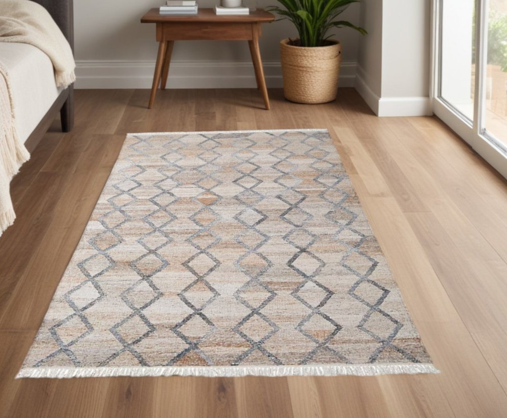 4' X 6' Gray Ivory And Tan Geometric Hand Woven Stain Resistant Area Rug With Fringe — view 1