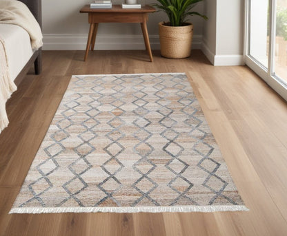 4' X 6' Gray Ivory And Tan Geometric Hand Woven Stain Resistant Area Rug With Fringe HomeRoots