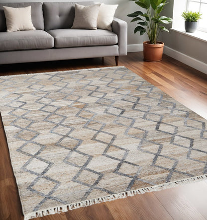 4' X 6' Gray Ivory And Tan Geometric Hand Woven Stain Resistant Area Rug With Fringe HomeRoots