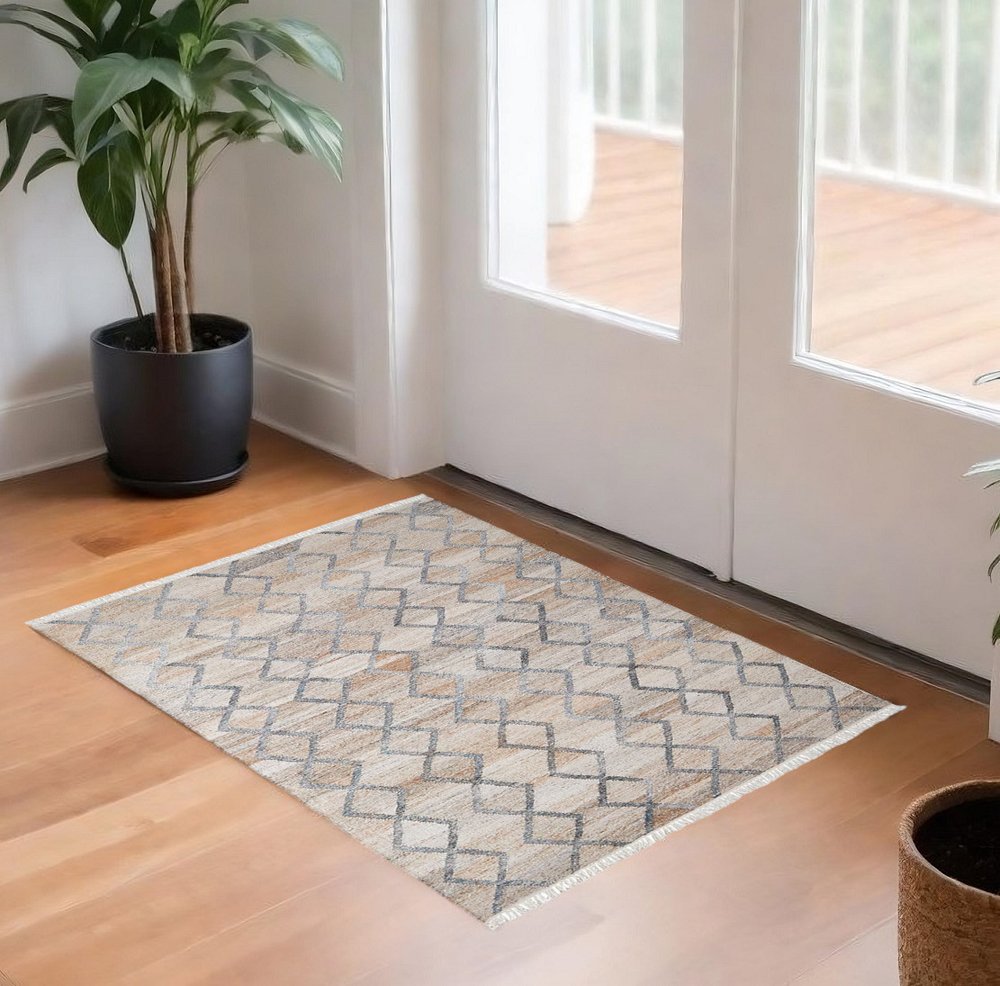 4' X 6' Gray Ivory And Tan Geometric Hand Woven Stain Resistant Area Rug With Fringe HomeRoots
