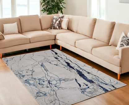 10' X 13' Ivory and Blue Marble Power Loom Distressed Area Rug - 24.0" (L) x 36.0" (W) x 0.39" (H)