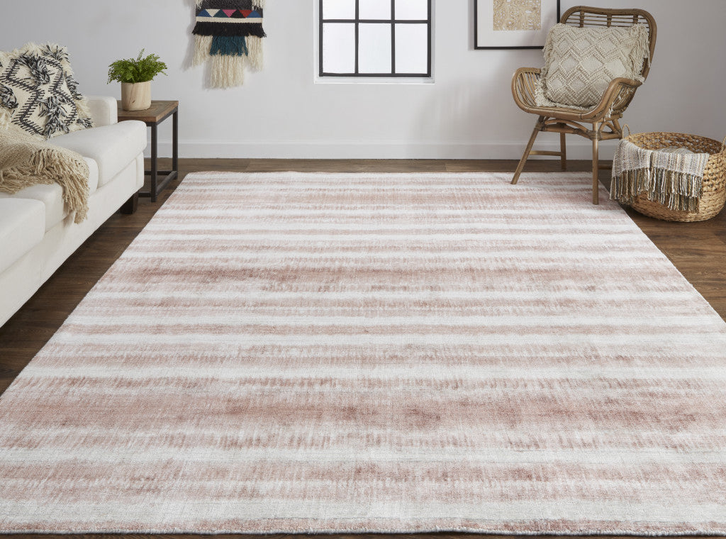 4' X 6' Tan Ivory And Pink Abstract Hand Woven Area Rug