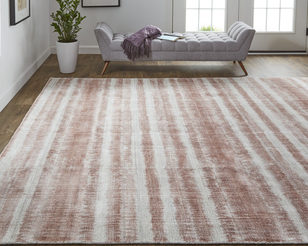 4' X 6' Tan Ivory And Pink Abstract Hand Woven Area Rug