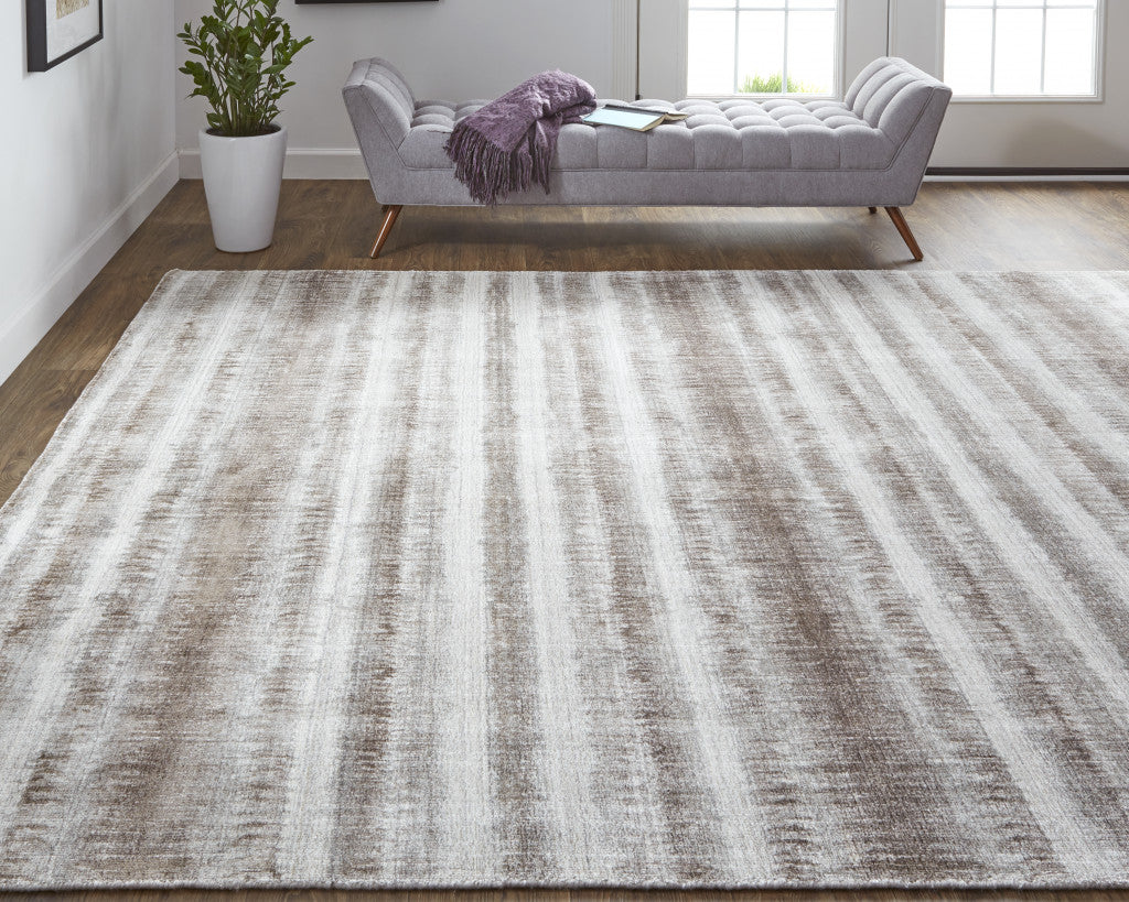 4' X 6' Tan Ivory And Pink Abstract Hand Woven Area Rug