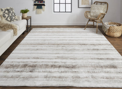 4' X 6' Tan Ivory And Pink Abstract Hand Woven Area Rug