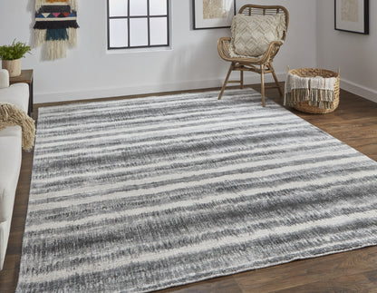 4' X 6' Tan Ivory And Pink Abstract Hand Woven Area Rug