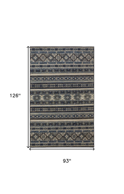 5' X 8' Blue Tan And Black Geometric Power Loom Distressed Stain Resistant Area Rug