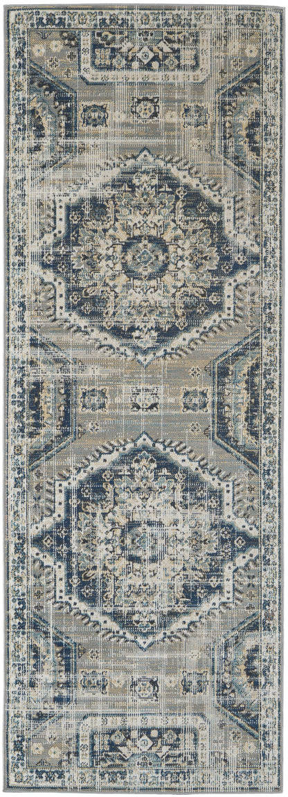 7' X 10' Blue And Ivory Abstract Power Loom Distressed Stain Resistant Area Rug