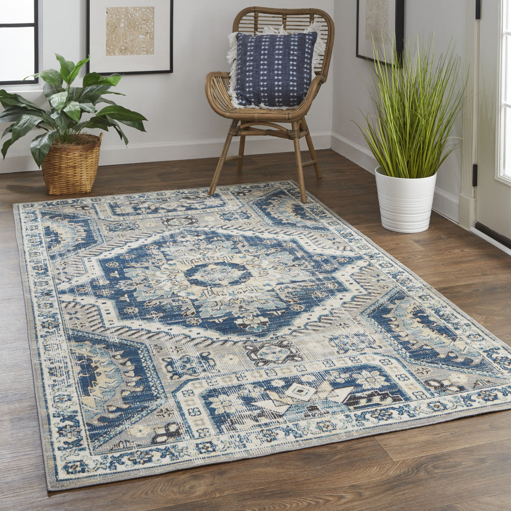 7' X 10' Blue And Ivory Abstract Power Loom Distressed Stain Resistant Area Rug