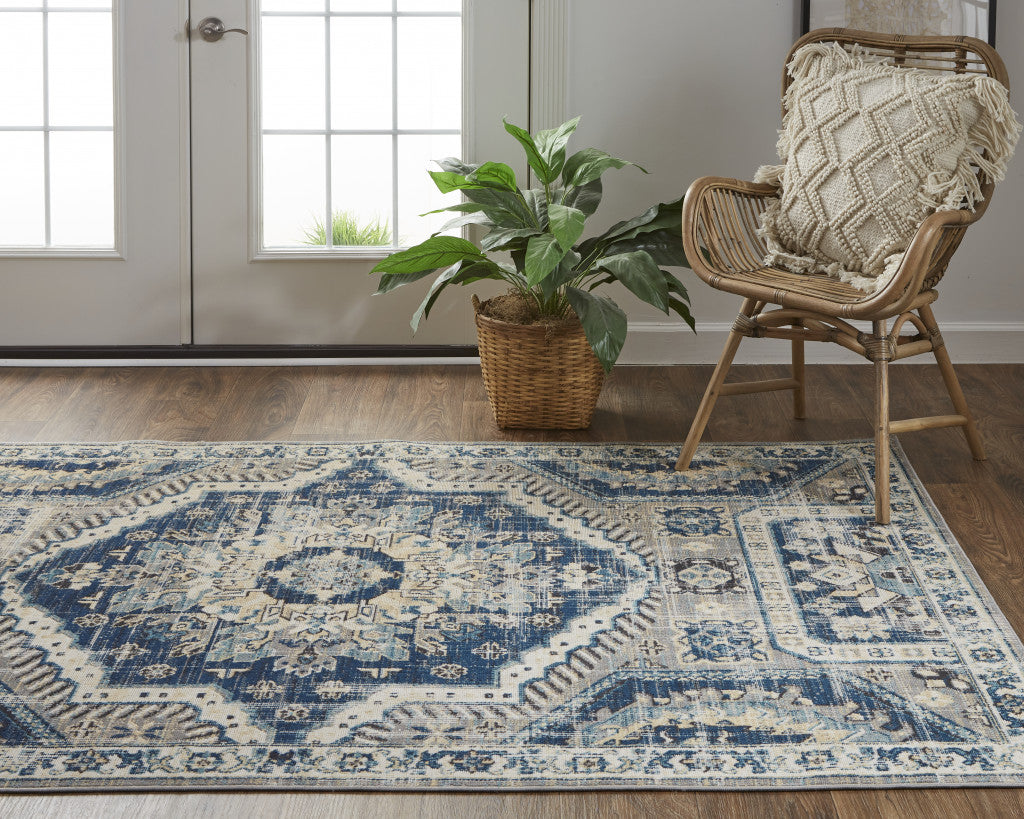 7' X 10' Blue And Ivory Abstract Power Loom Distressed Stain Resistant Area Rug