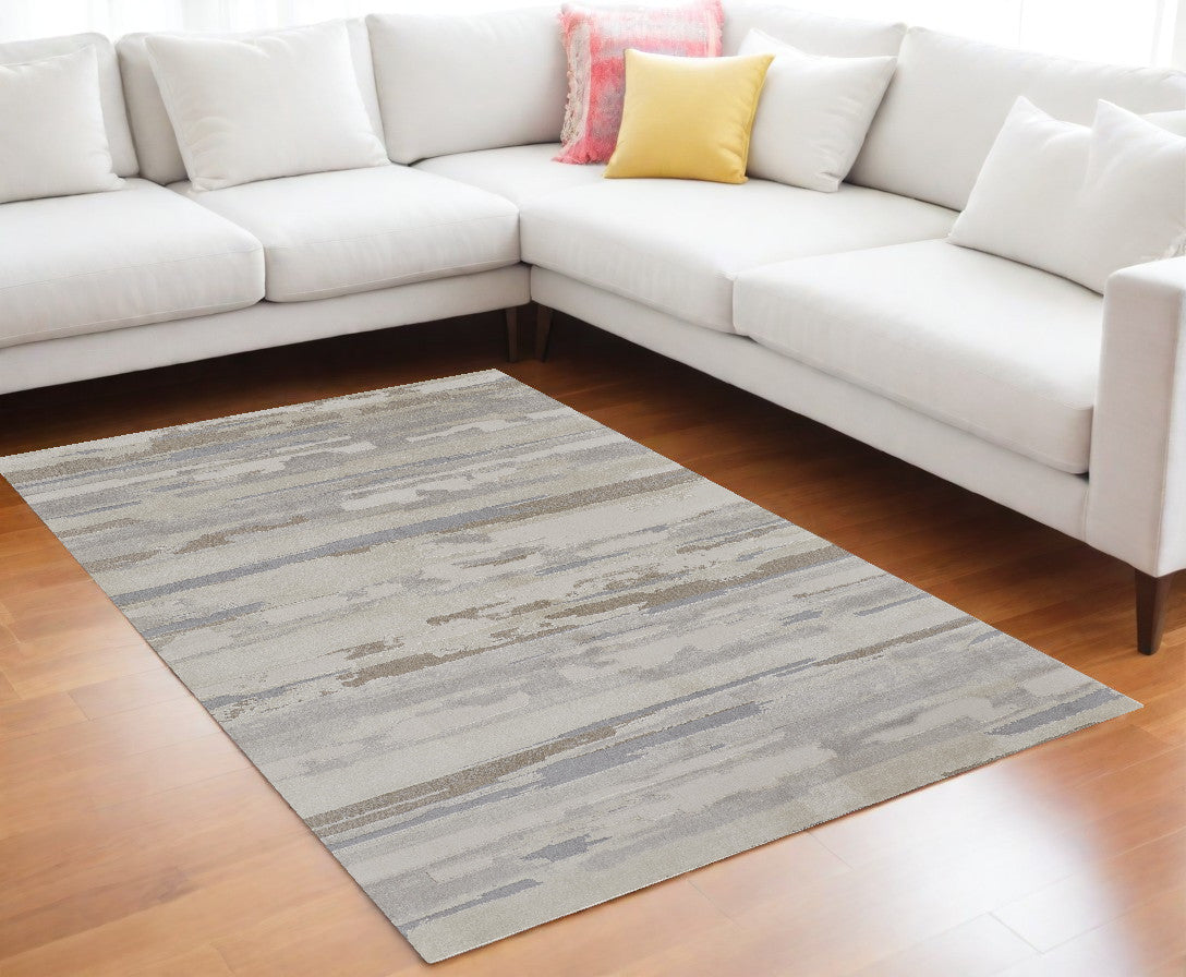 9' X 12' Brown and Ivory Abstract Power Loom Distressed Area Rug - 108.0" (H) x 144.0" (W) x 0.63" (D)