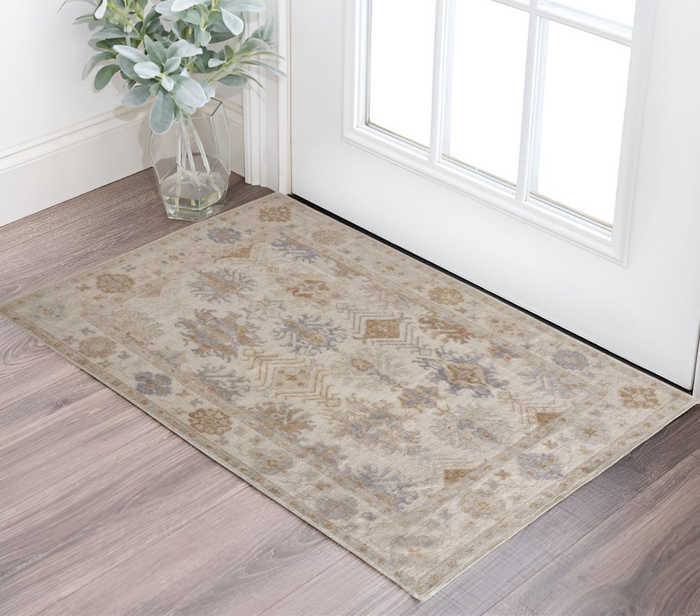 8' X 10' Ivory Tan And Blue Floral Hand Knotted Area Rug HomeRoots