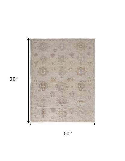 4' X 6' Tan and Brown Floral Hand Knotted Area Rug HomeRoots