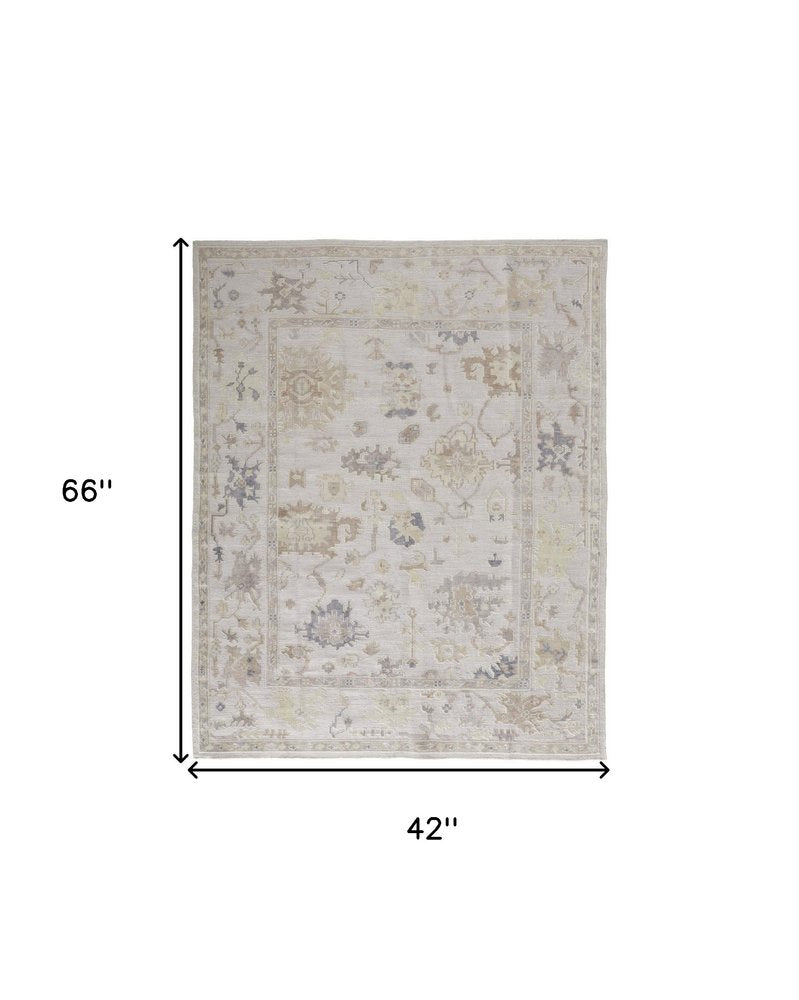 4' X 6' Tan Ivory And Orange Floral Hand Knotted Stain Resistant Area Rug — view 1