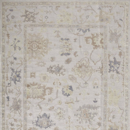 8' X 10' Tan Ivory And Orange Floral Hand Knotted Stain Resistant Area Rug