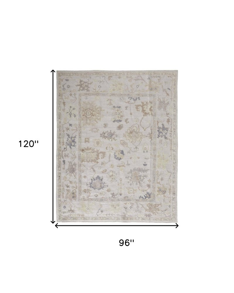 8' X 10' Tan Ivory And Orange Floral Hand Knotted Stain Resistant Area Rug